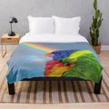 Colorful rainbow lorikeet bird on a plush blanket