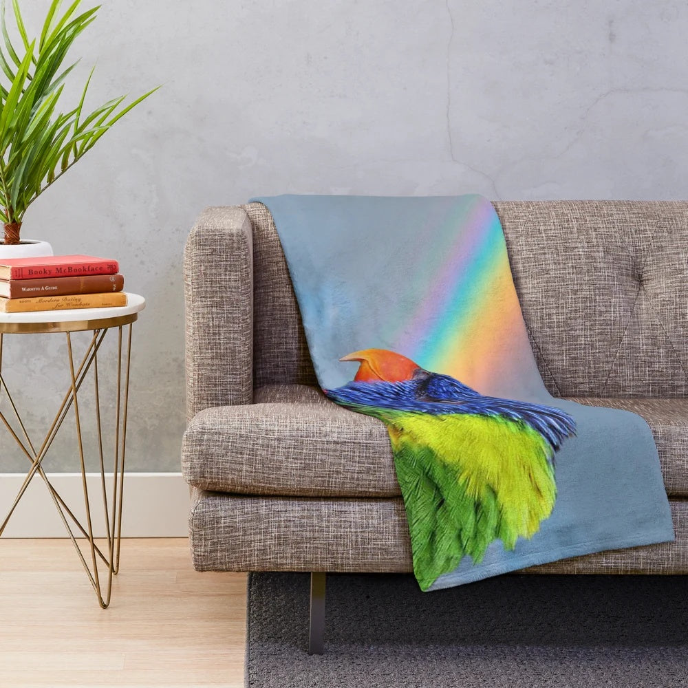 Colorful rainbow lorikeet bird on a plush blanket