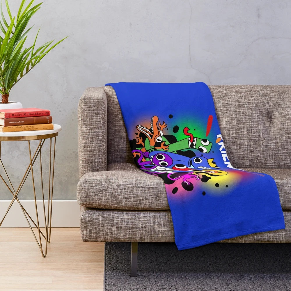 Colorful plush blanket featuring rainbow-colored monster friends from Roblox