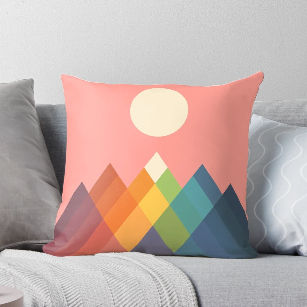 Colorful mountain and rainbow pattern pillow with geometric design
