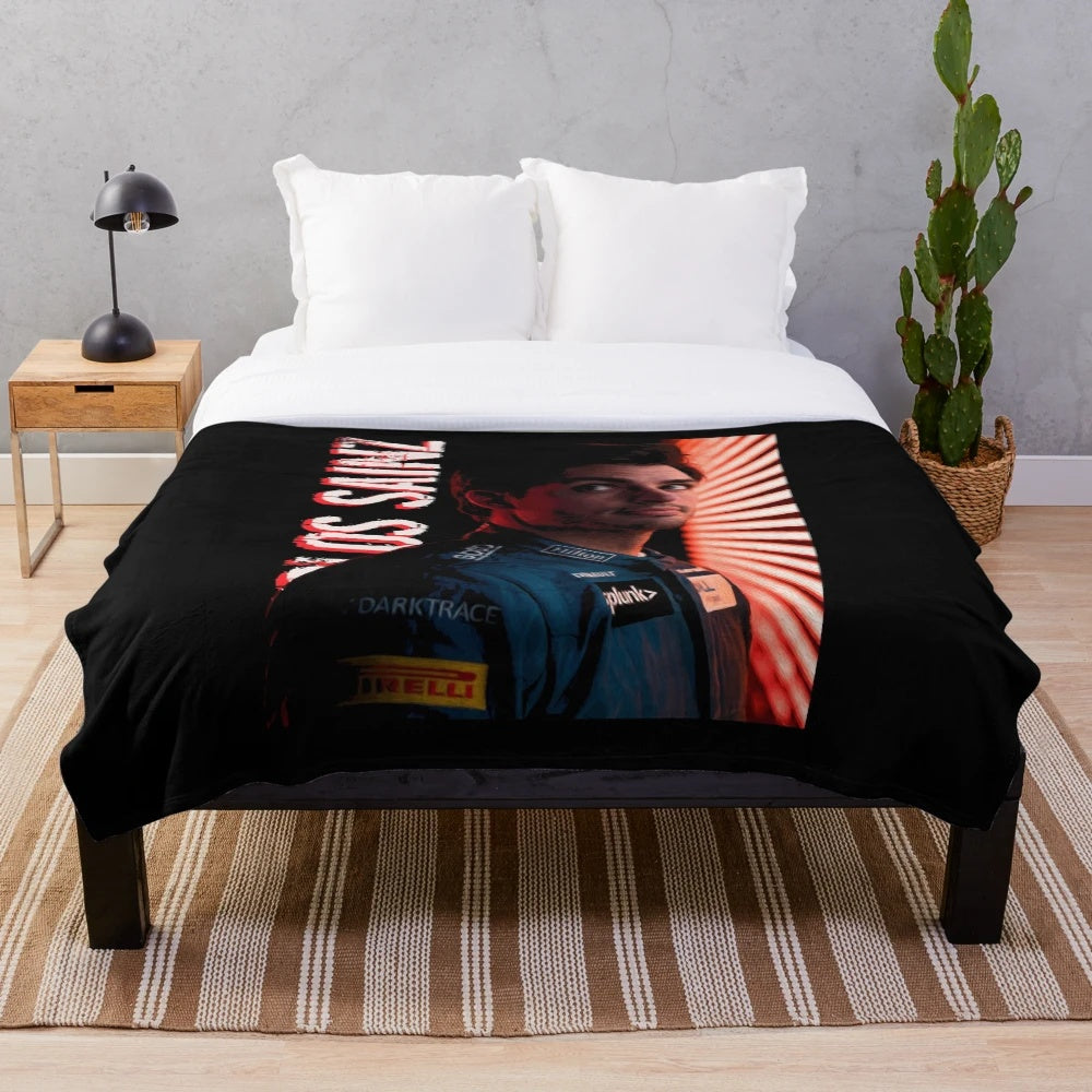 Colorful rainbow plush blanket with Formula 1 driver Carlos Sainz Jr. design