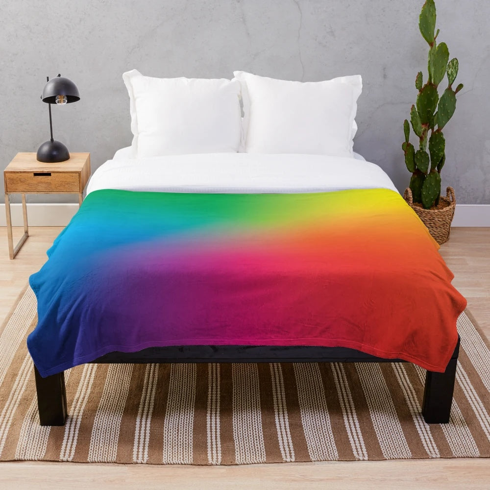 Soft, colorful rainbow plush blanket