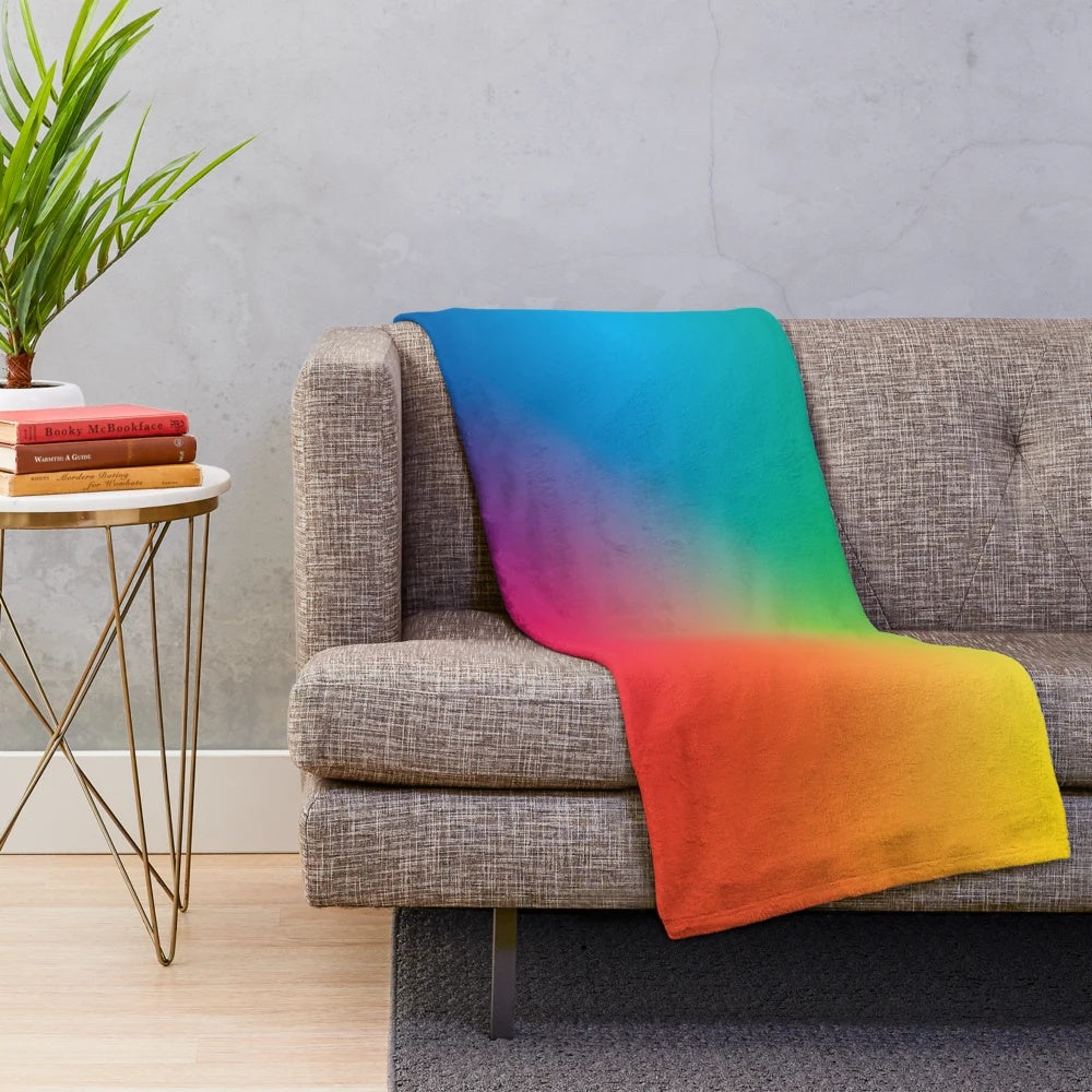 Soft, colorful rainbow plush blanket