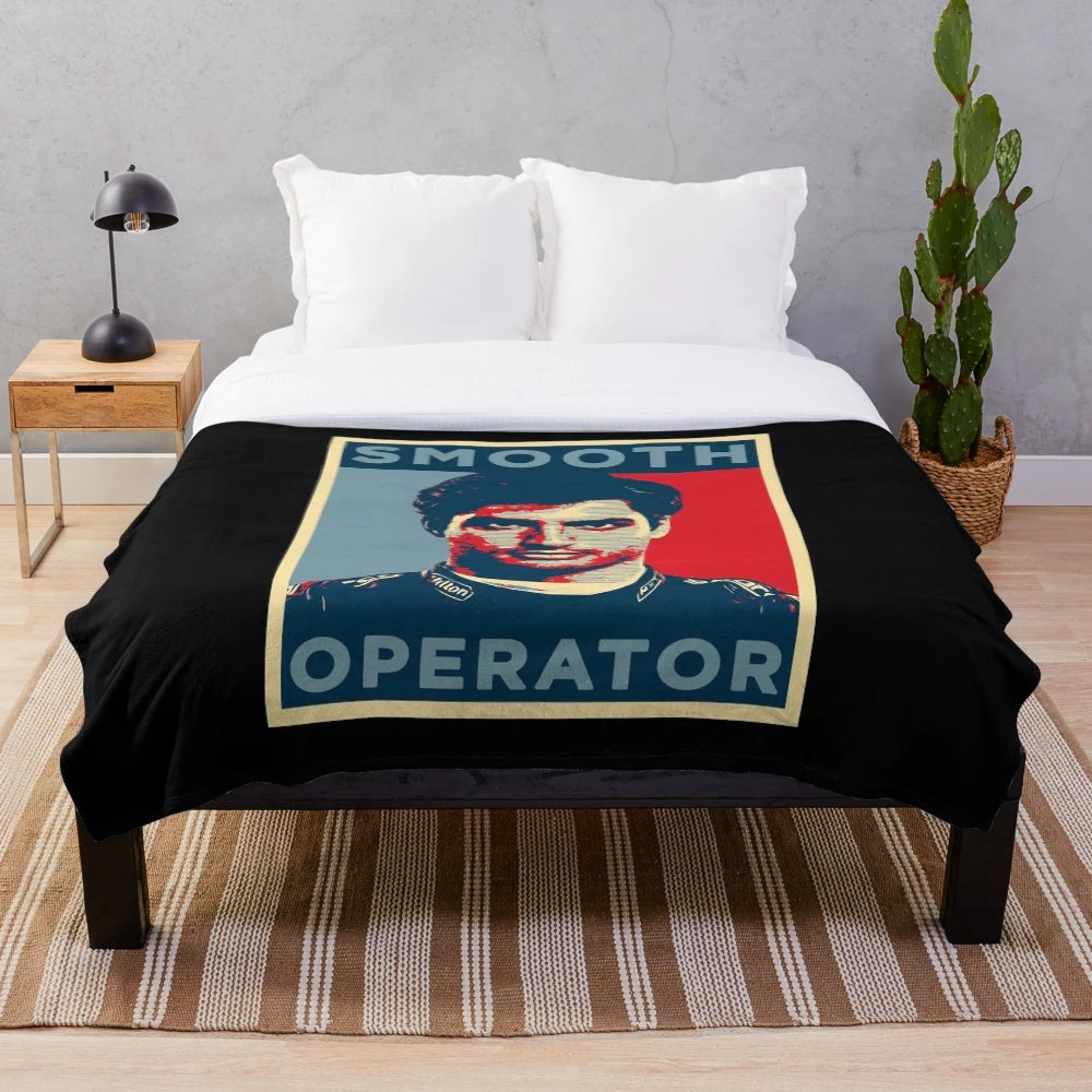 Colorful rainbow plush blanket with motorsport driver Carlos Sainz's name and racing car design