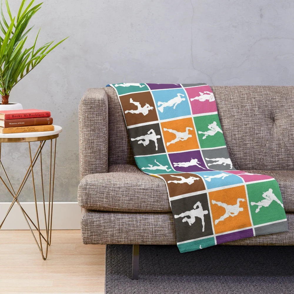 Vibrant rainbow patterned plush blanket featuring a Fortnite-inspired victory dance design