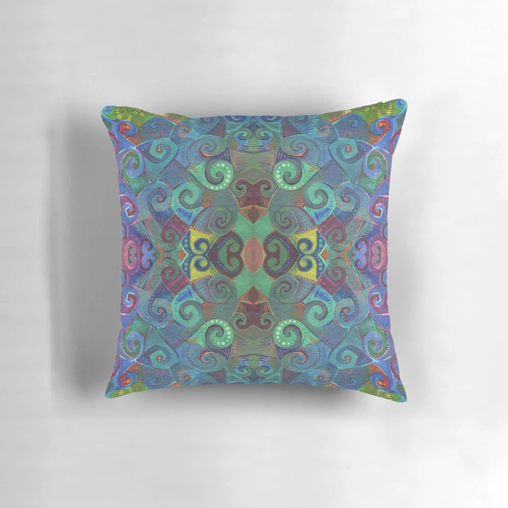 Colorful rainbow swirl design pillow with blue and green hues