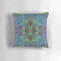 Colorful rainbow swirl design pillow with blue and green hues