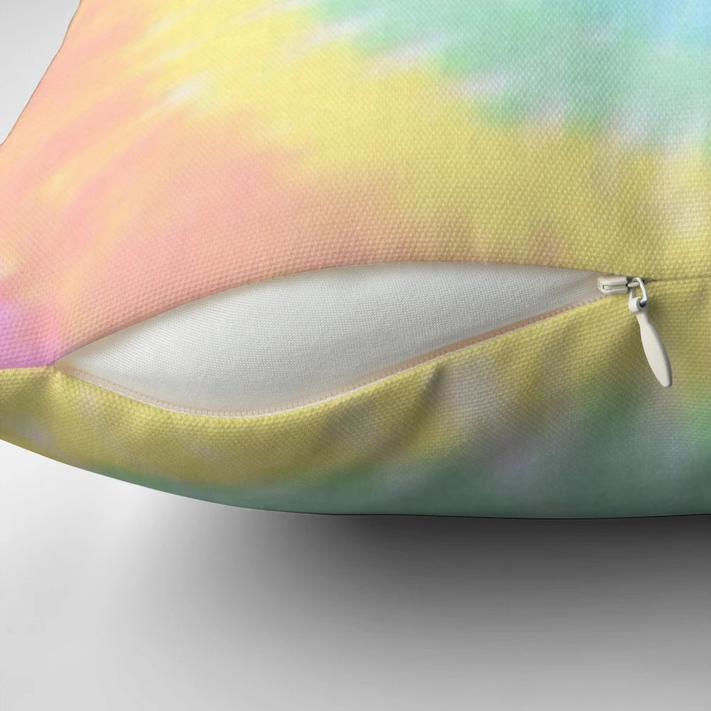 Vibrant rainbow tie dye decorative pillow with a soft, plush texture