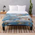 Raining fish plush blanket with surreal, colorful patterns