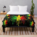 Colorful plush blanket with an abstract rasta leaf pattern