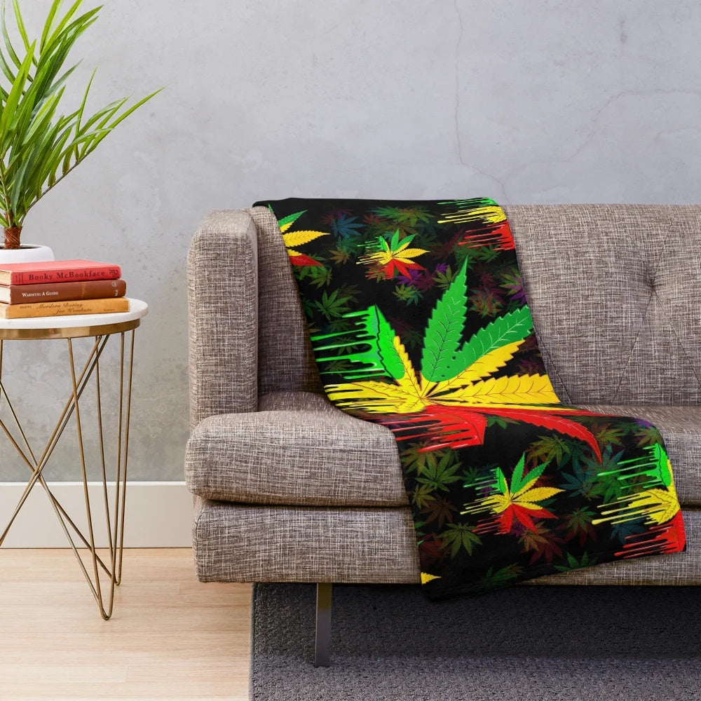 Colorful plush blanket with an abstract rasta leaf pattern