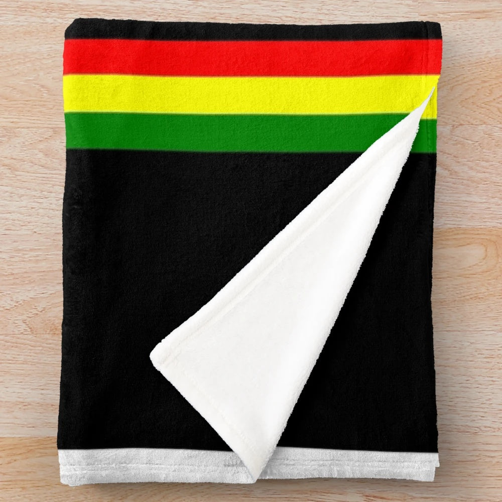 Rasta-inspired plush blanket with vibrant colors and patterns