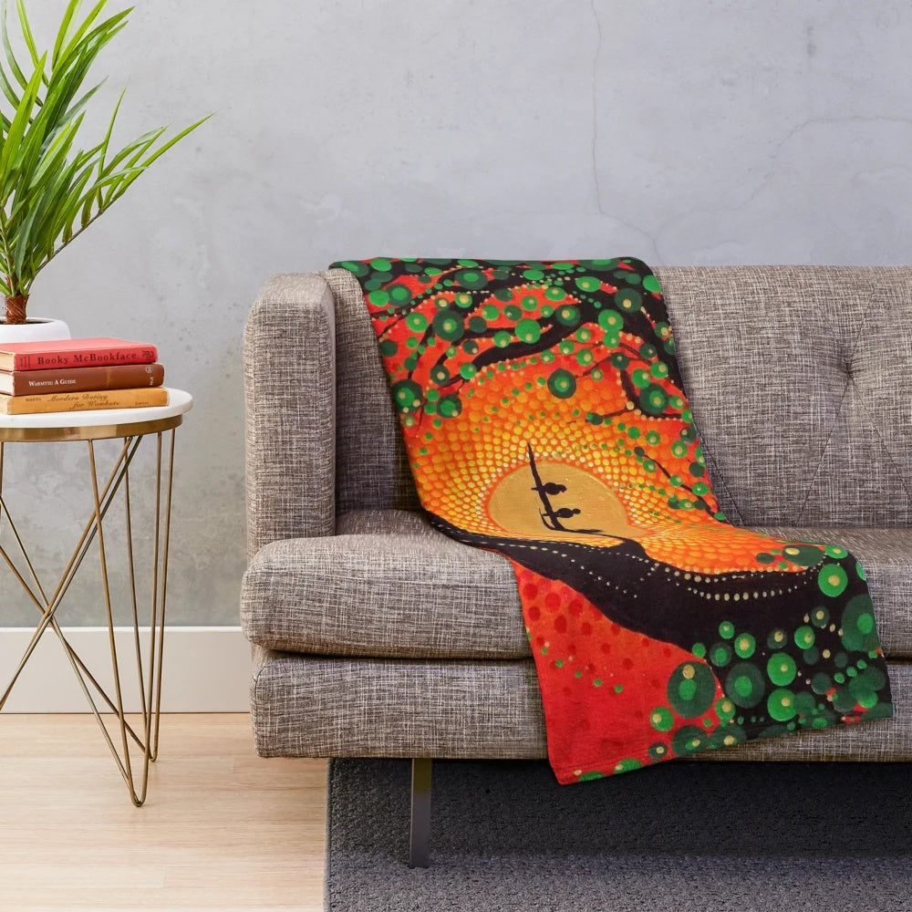 Colorful plush blanket featuring a dot art design of three little birds against a rasta-inspired background