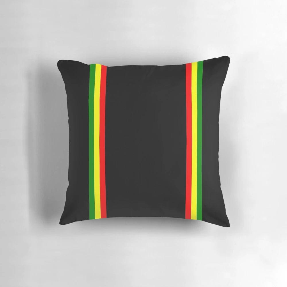 Colorful rasta-inspired striped pattern pillow with bold, vibrant colors