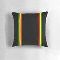 Colorful rasta-inspired striped pattern pillow with bold, vibrant colors