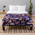 Plush blanket featuring a colorful ray design