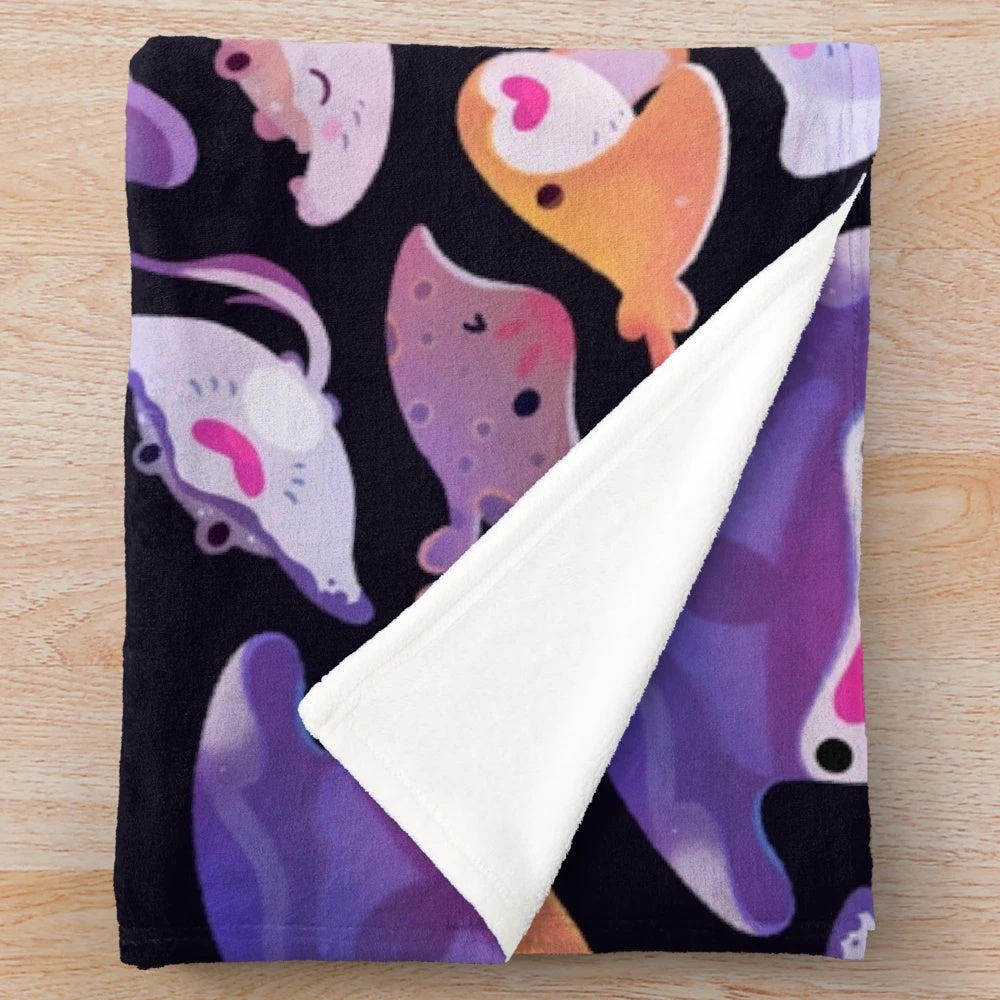 Plush blanket featuring a colorful ray design