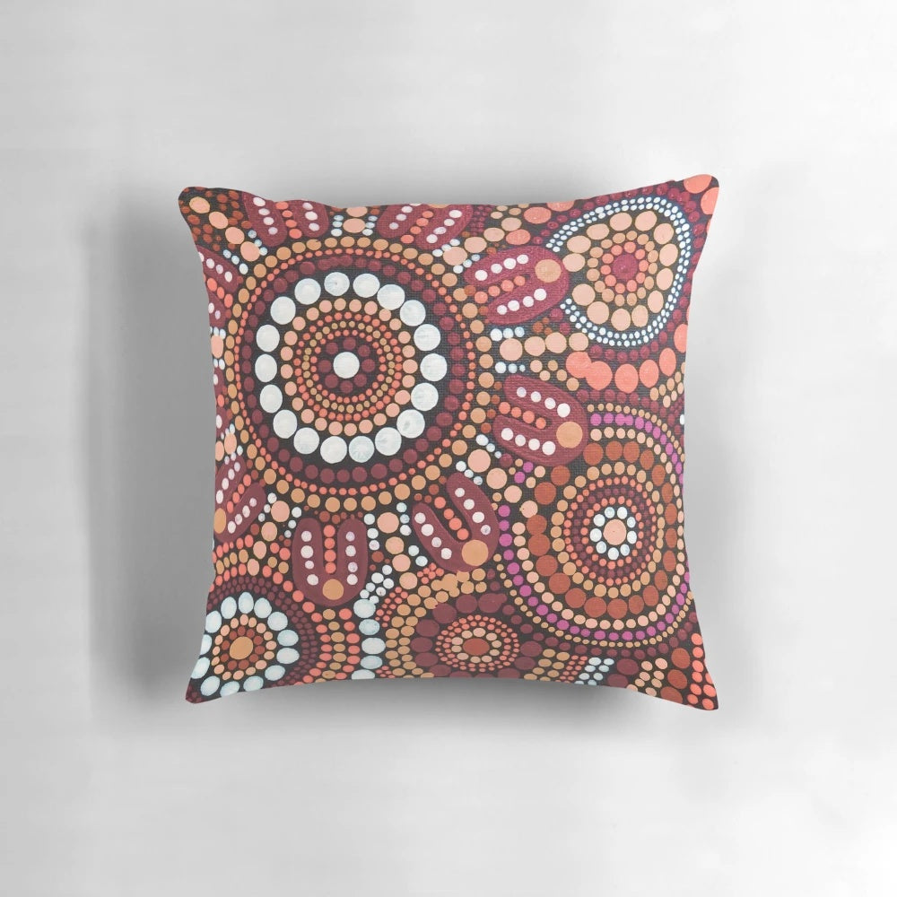 Vibrant red aboriginal art pattern pillow showcasing traditional Australian indigenous dot art and dreamtime motifs.