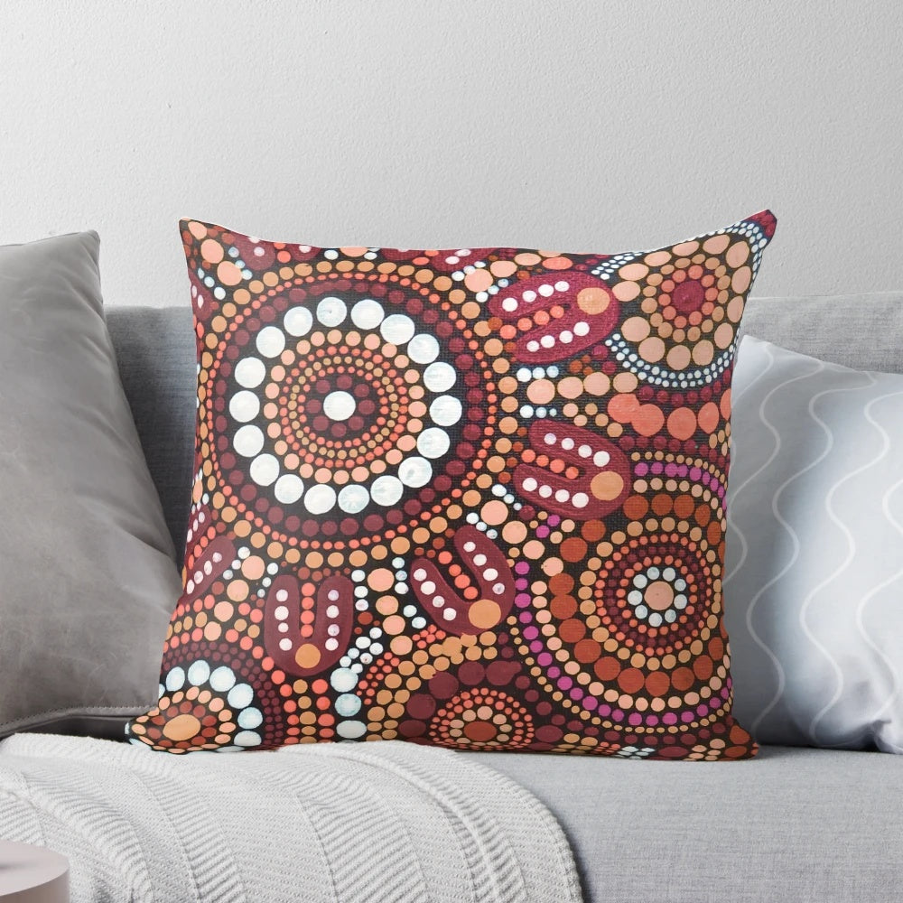 Vibrant red aboriginal art pattern pillow showcasing traditional Australian indigenous dot art and dreamtime motifs.