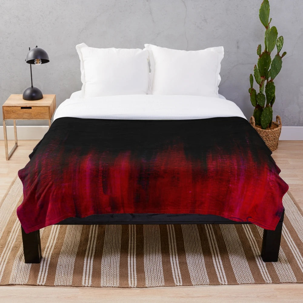 Vibrant red and black abstract plush blanket