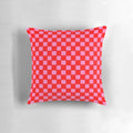 Colorful checkered pattern pillow in red and pink shades for bedroom, living room or kitchen