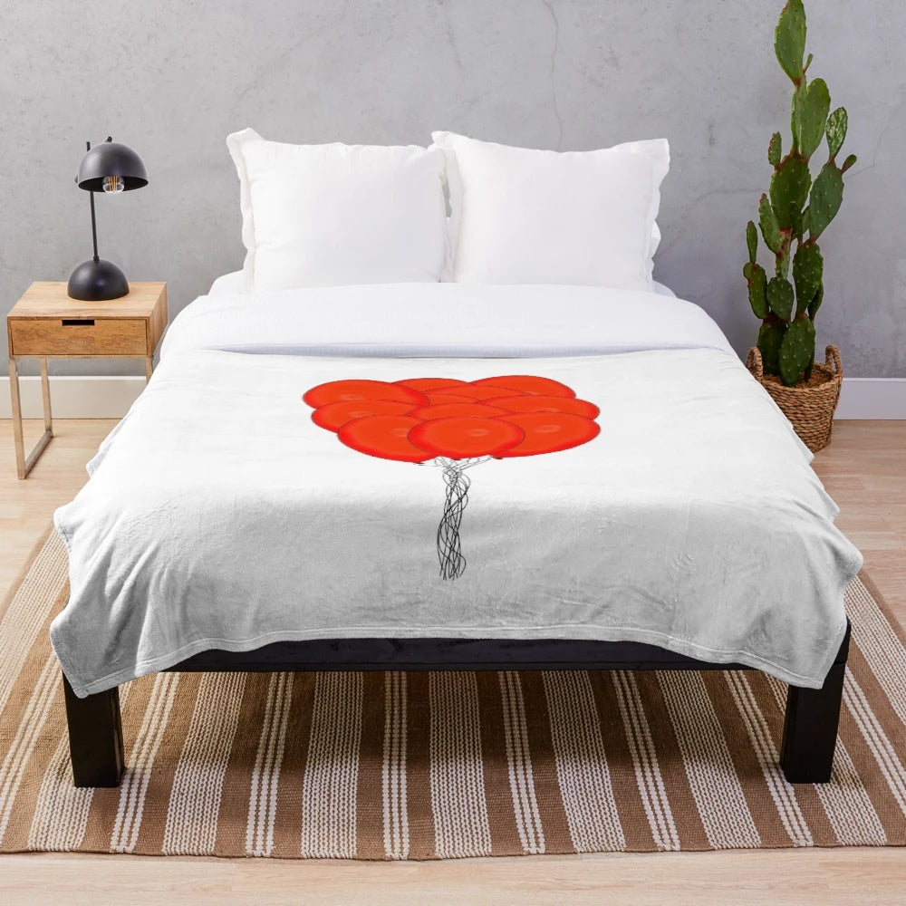 Soft and plush red ball-patterned blanket for comfort and style