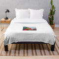 Soft, plush blanket featuring a playful red balloon design