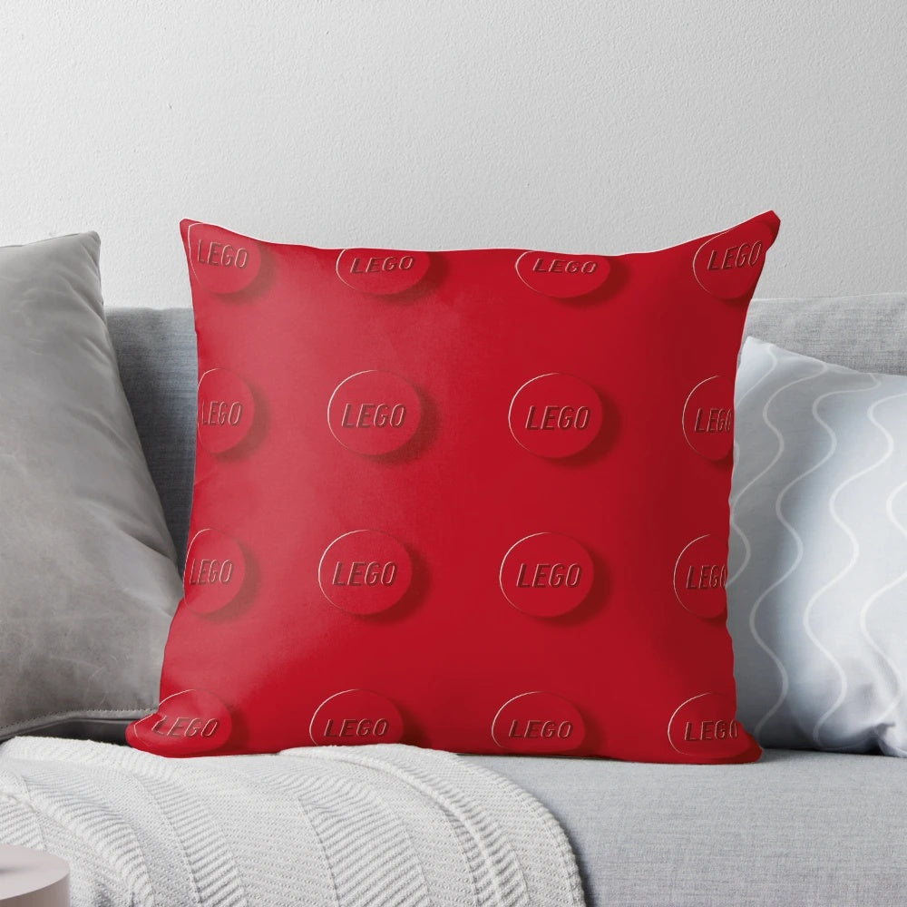 Colorful red building blocks design pillow, perfect for a modern kids room or living space.