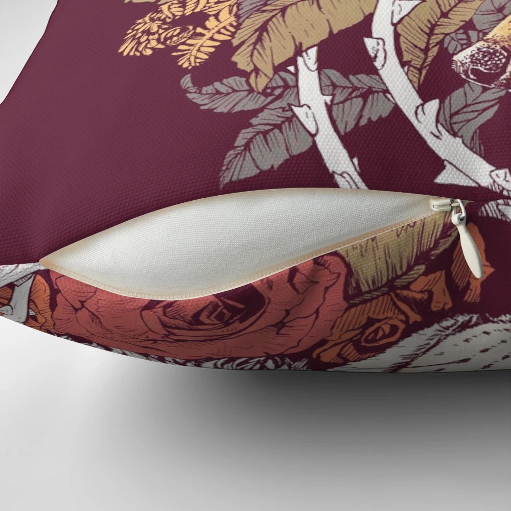 A vibrant red fox bloom pillow with a floral nature motif.