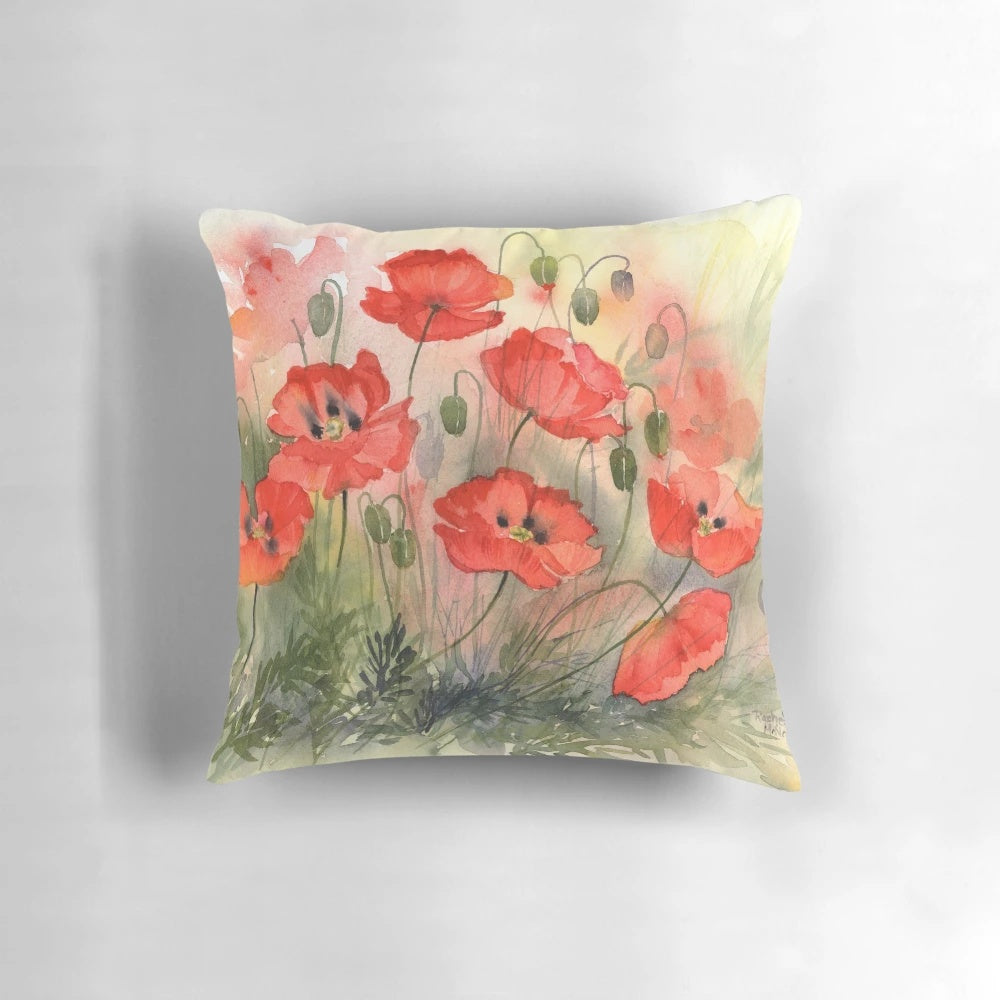 Watercolor painting of vibrant red poppy flowers on a pillow