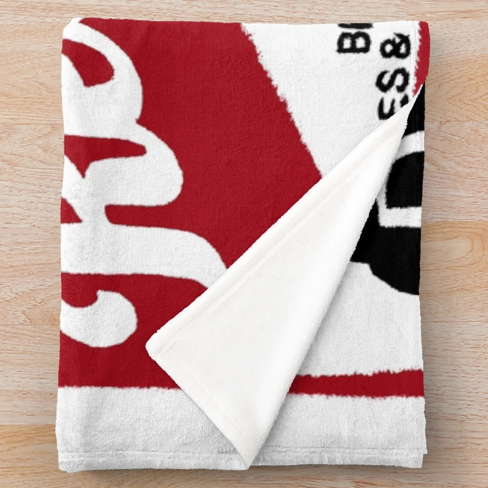 Red stripe plush blanket with beer logo design