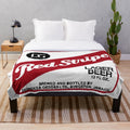 Red and white striped plush blanket
