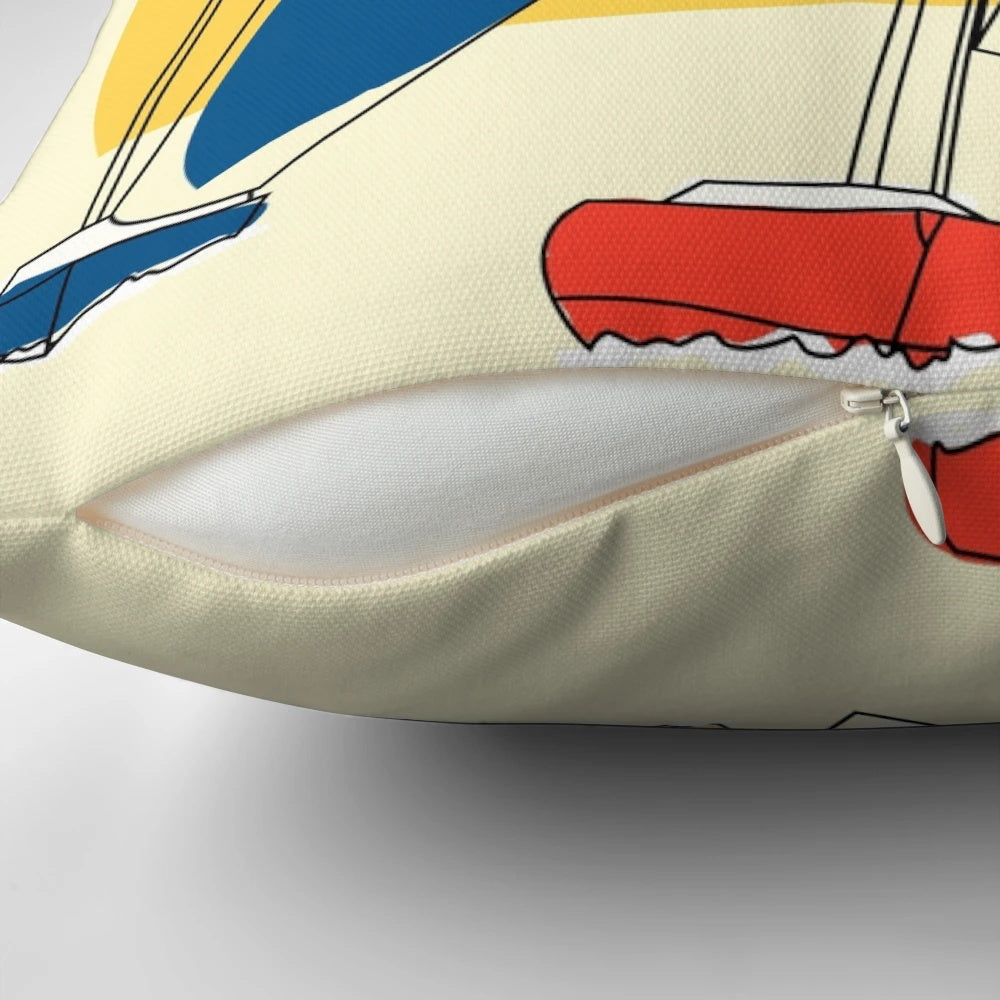 Colorful Pillow Featuring a Regatta Sail Boat Design