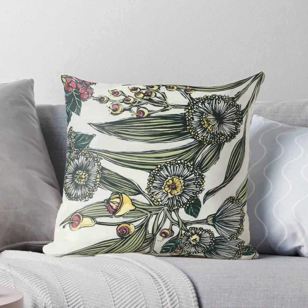 Retro-inspired floral pillow featuring hand-painted Australian native botanicals like gumleaves, gumnuts, and olive foliage.