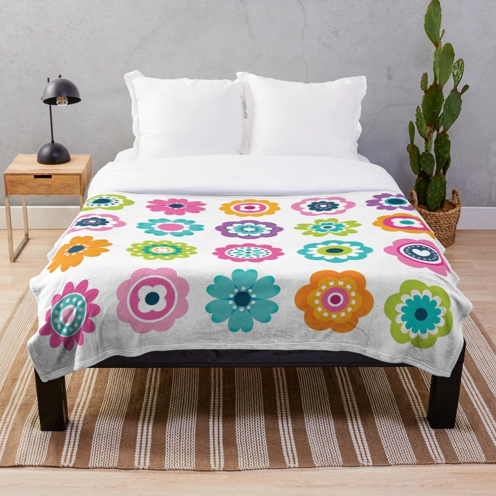 Colorful plush blanket with a vibrant retro floral pattern