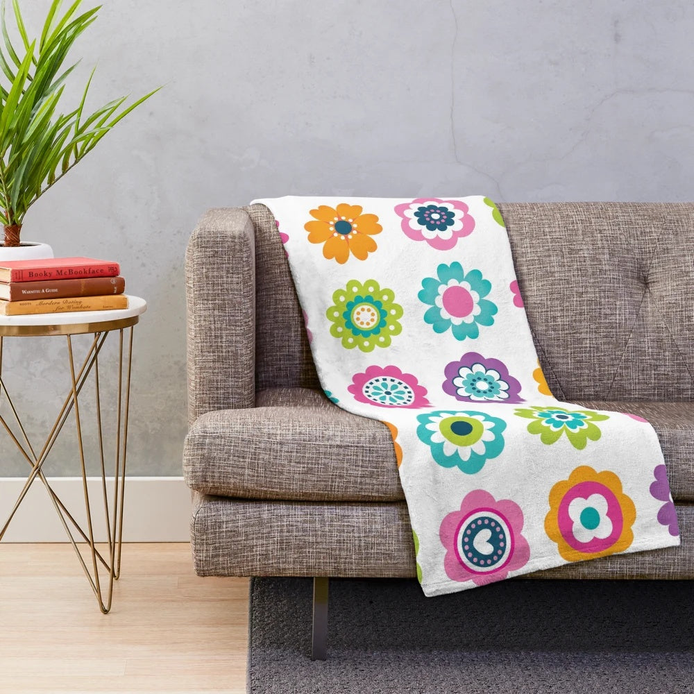 Colorful plush blanket with a vibrant retro floral pattern
