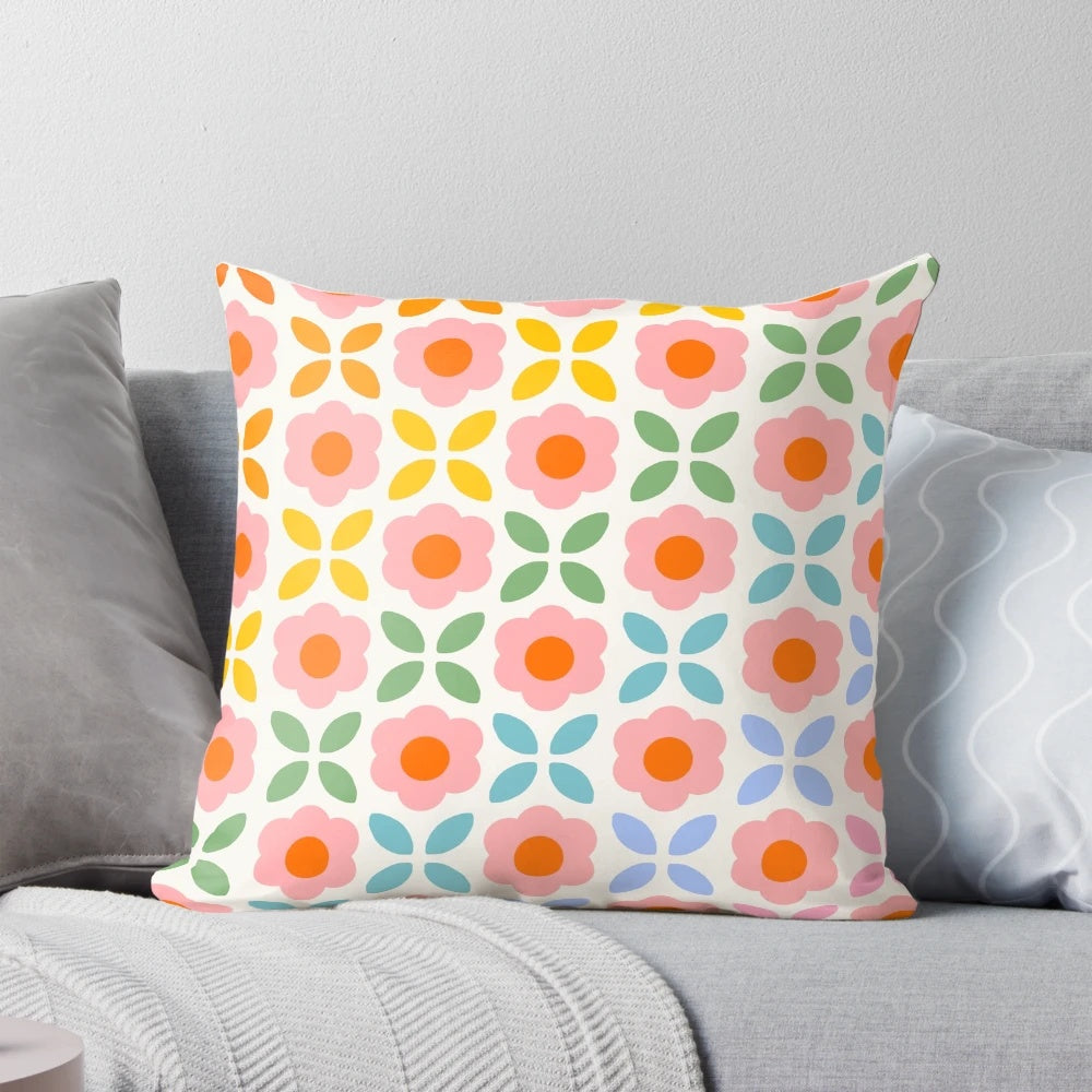 Colorful retro flower pattern rainbow throw pillow with a boho, groovy design