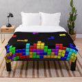Retro game pattern plush blanket with colorful squares and shapes