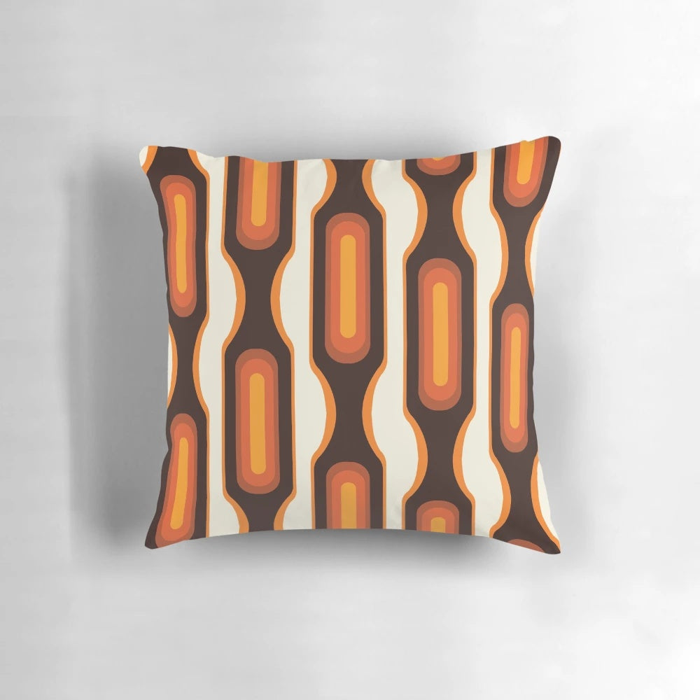Colorful orange 1970s-inspired capsule-shaped throw pillow with a modern mid-century design