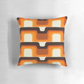 Vibrant orange and white mid-century modern inspired pillow with retro stripes and curves
