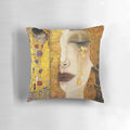 Pillow featuring a vibrant, romantic collage design inspired by Gustav Klimt's famous 'The Kiss' painting.