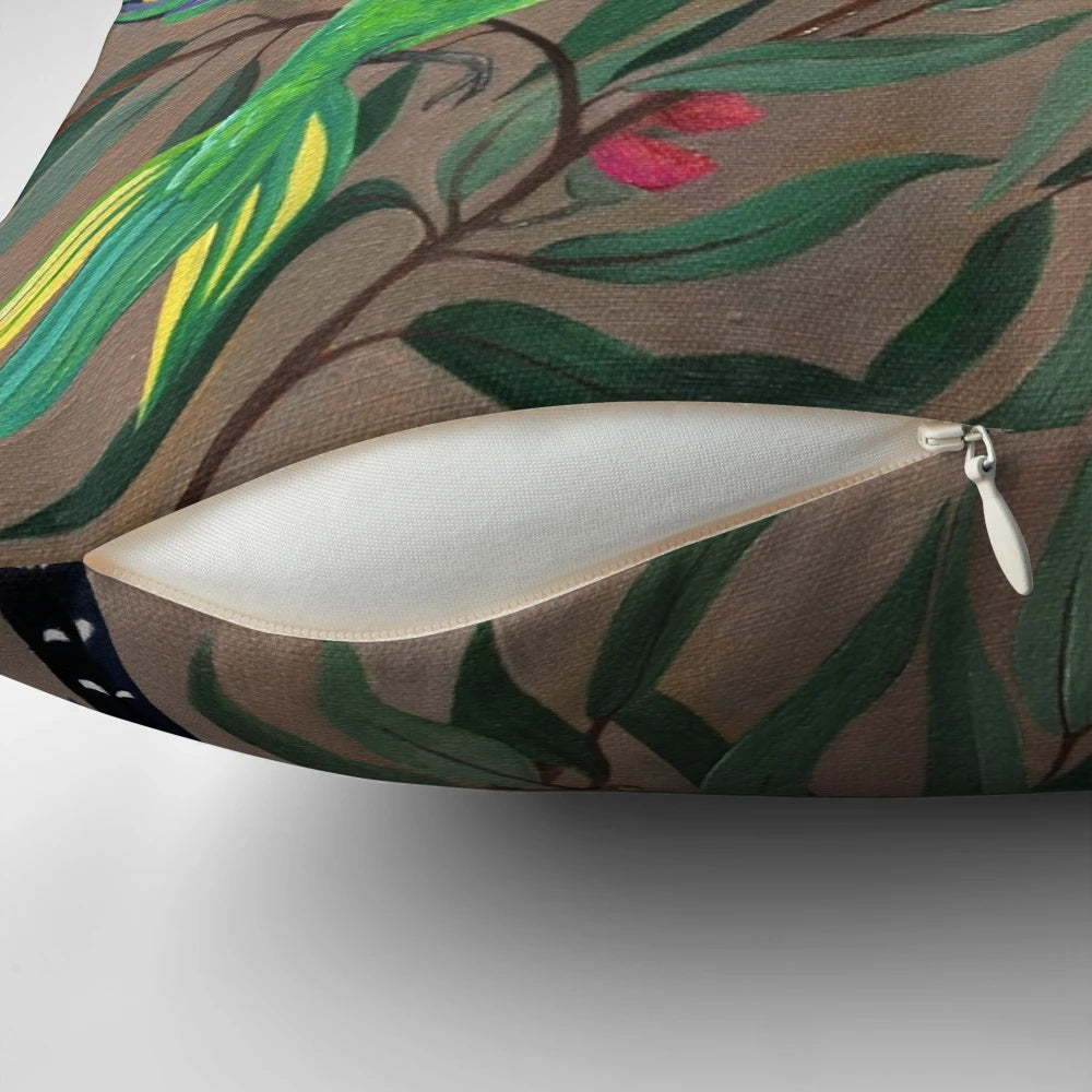 Colorful rosella parrots perched on a branch, featured on a decorative throw pillow.