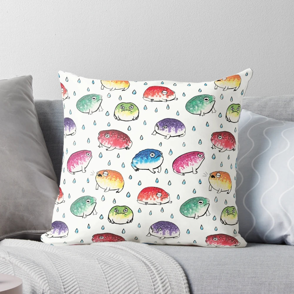 Vibrant round pillow featuring a colorful design of cute rain frogs