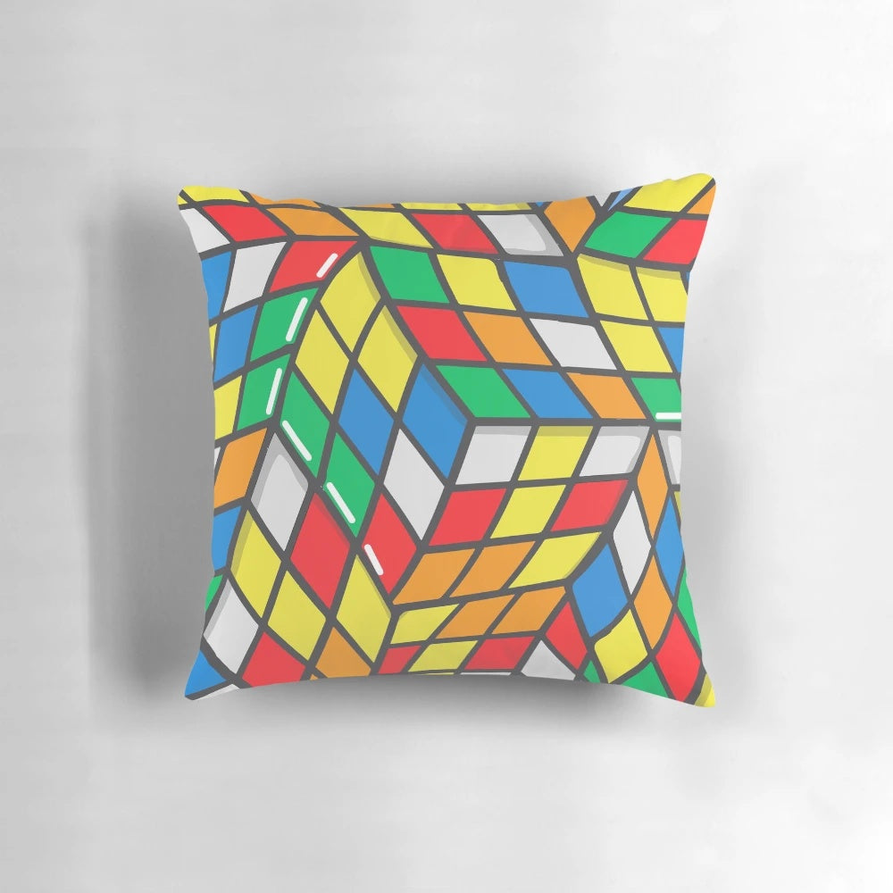 Colorful Rubik's Cube pattern printed on a fluffy, soft pillow creating a 3D optical illusion effect