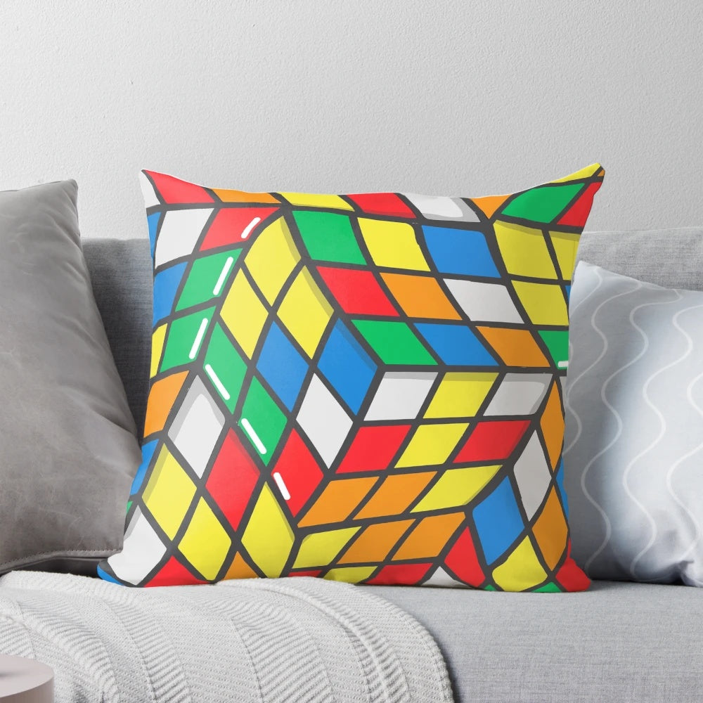 Colorful Rubik's Cube pattern printed on a fluffy, soft pillow creating a 3D optical illusion effect