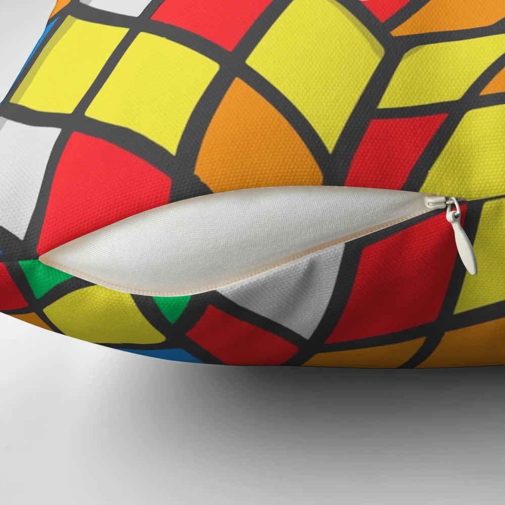 Colorful Rubik's Cube pattern printed on a fluffy, soft pillow creating a 3D optical illusion effect