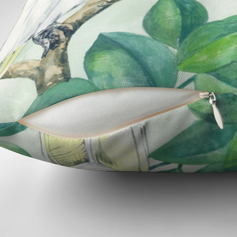Colorful saffron cockatoos perched on a branch against a green and yellow background on a throw pillow