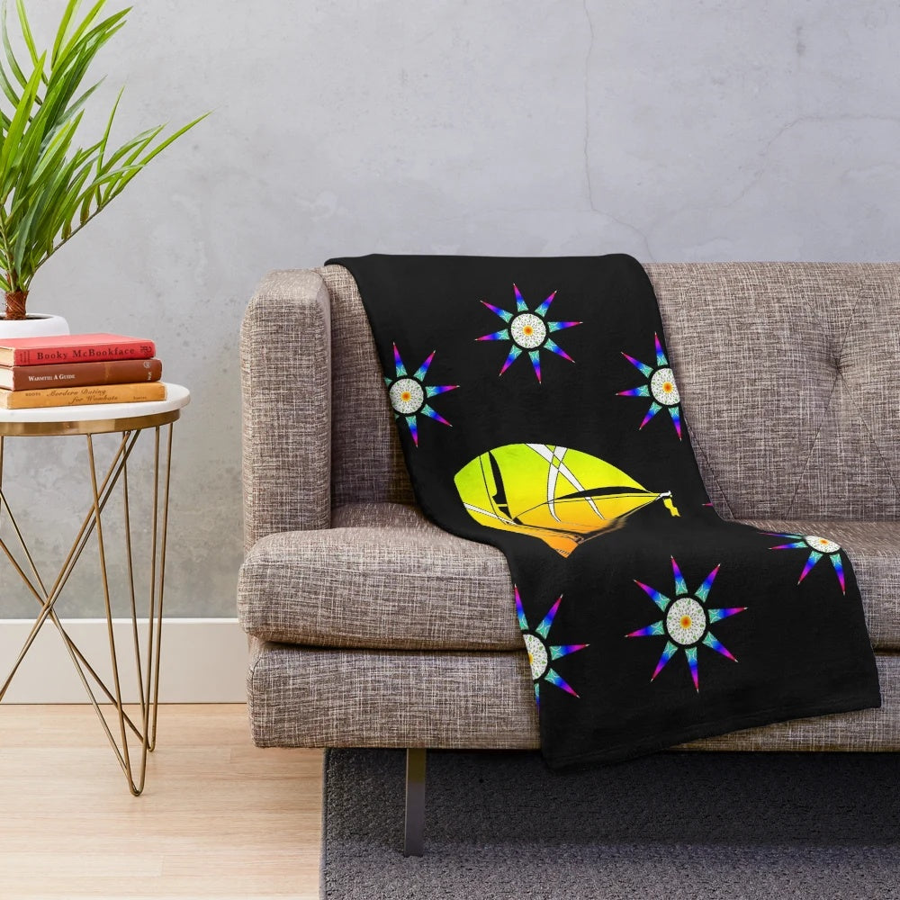 Colorful sailing-themed plush blanket with abstract patterns and floral designs