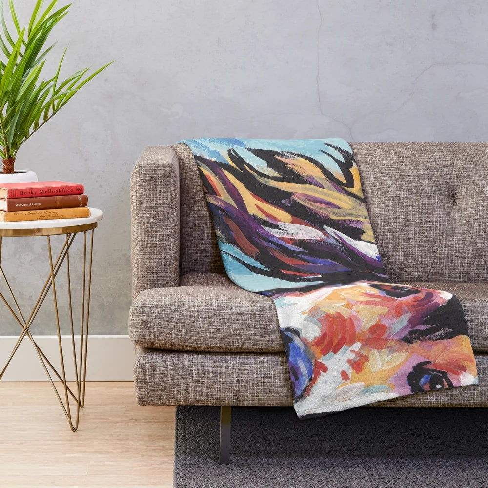 Colorful pop art portrait of a Saluki hound dog on a plush blanket