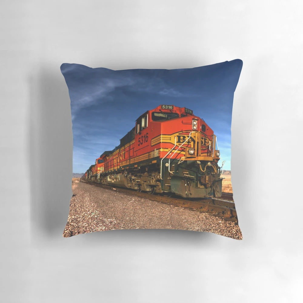 Colorful Santa Fe-style pillow featuring an illustration of a classic American freight train
